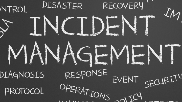 image of texts of incident management written in white chalk on black background